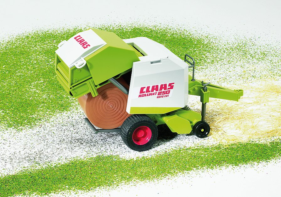 BRUDER 2121 Zeleno bílý BALÍKOVAČ slámy CLAAS Rollant 250 BR 2121