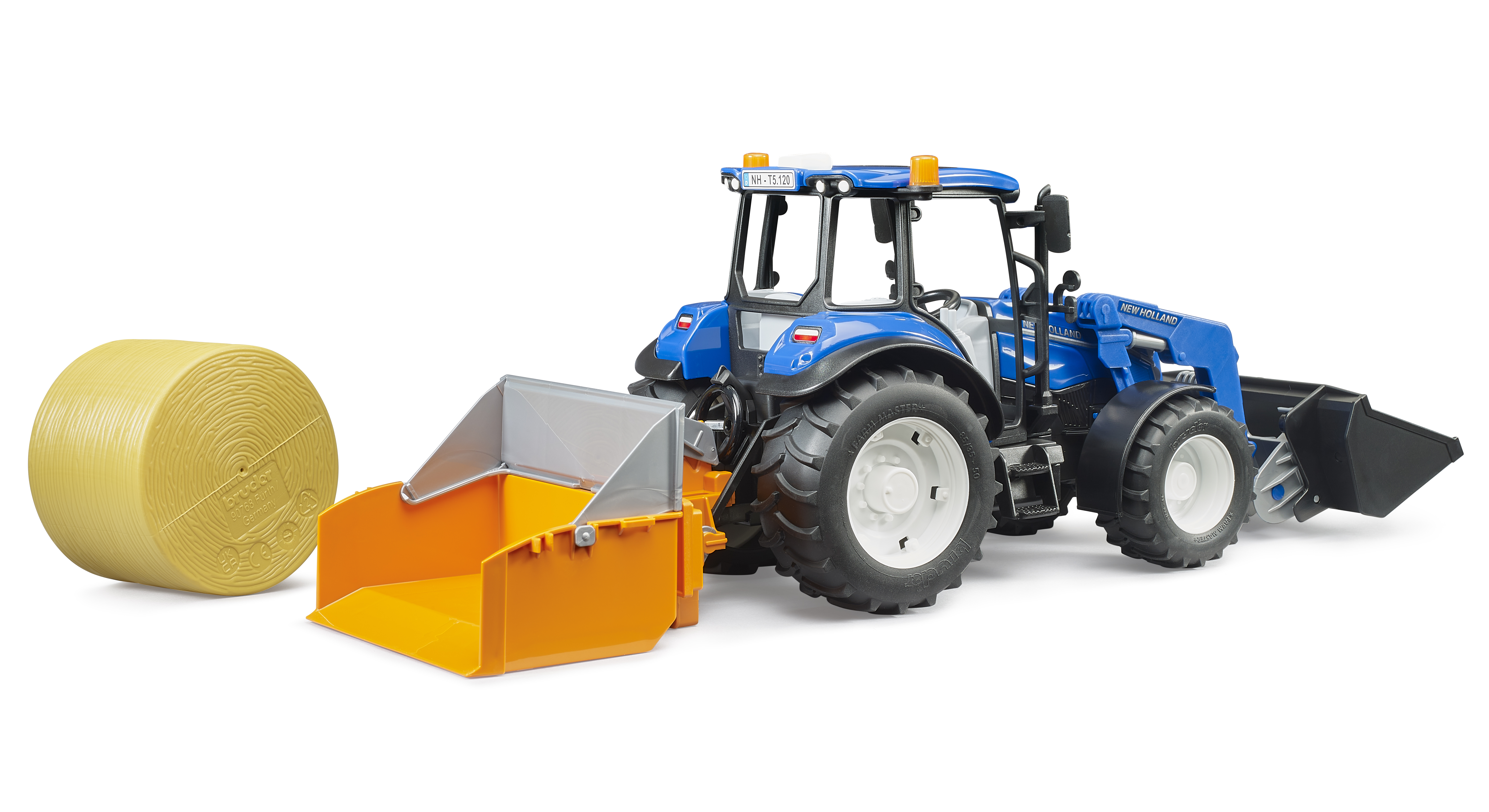 BRUDER 2187 Traktor New Holland T5.120 s čelním nakladačem, korbou, vidlemi a kulatým balíkem