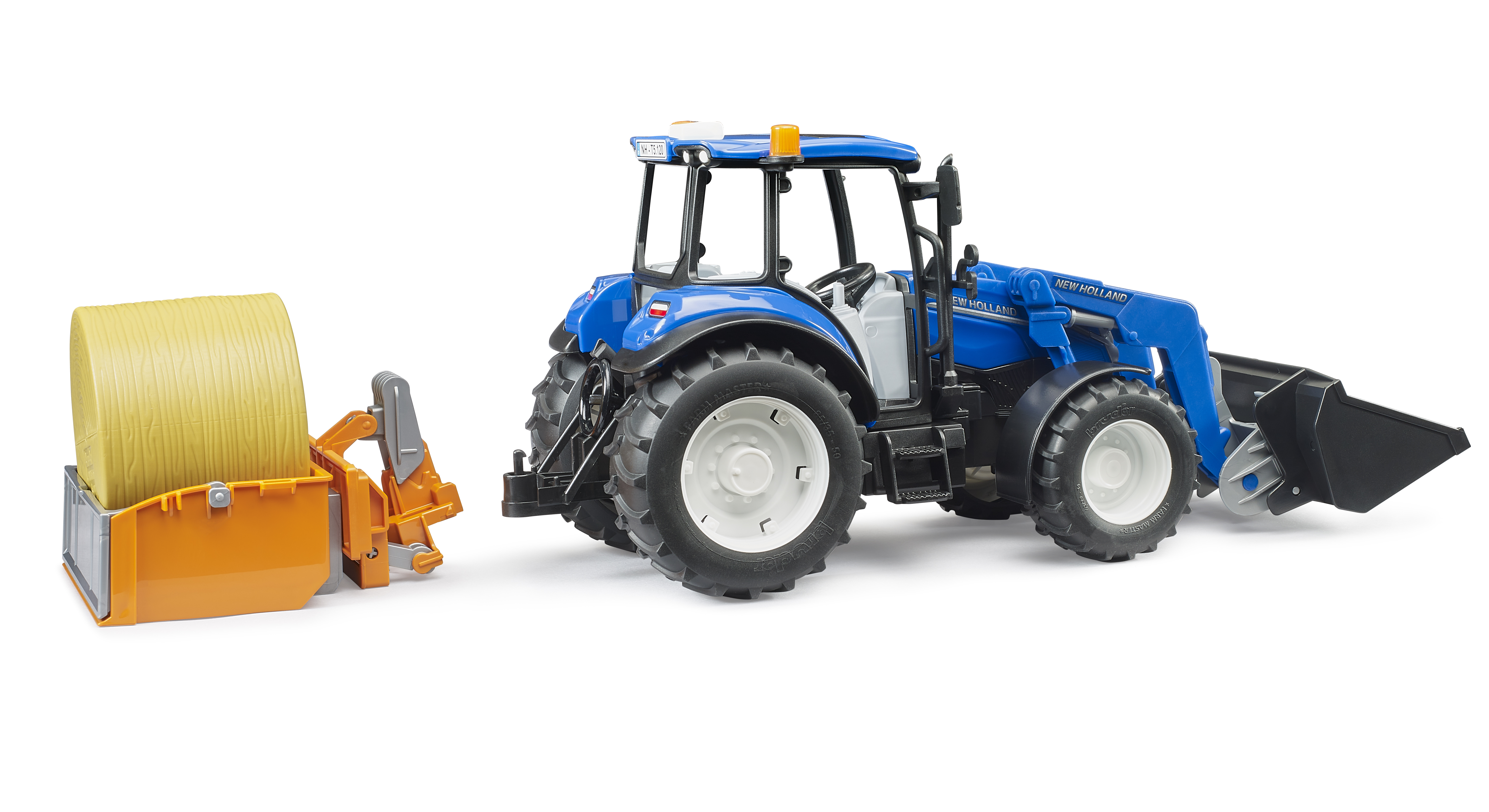 BRUDER 2187 Traktor New Holland T5.120 s čelním nakladačem, korbou, vidlemi a kulatým balíkem