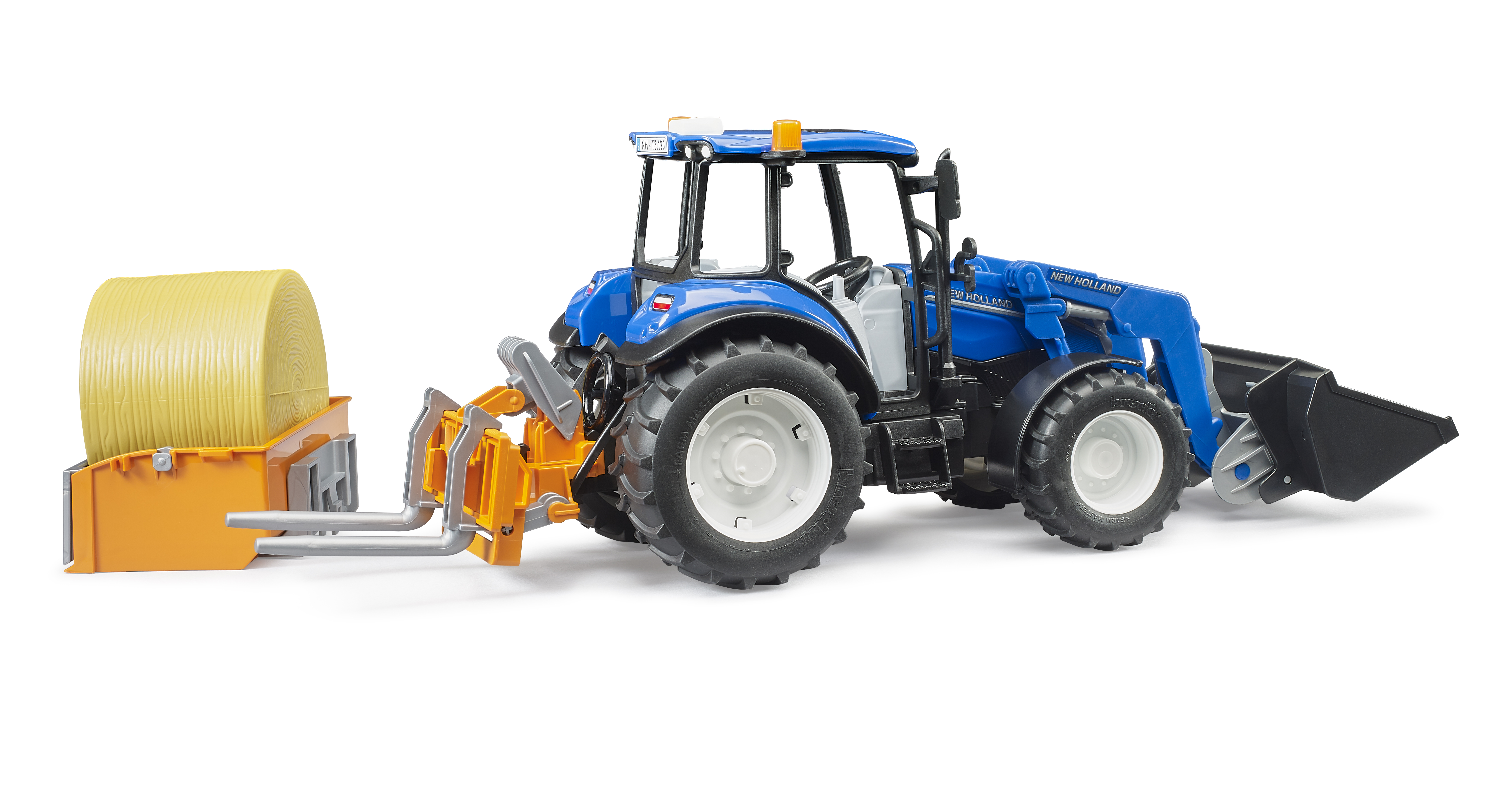 BRUDER 2187 Traktor New Holland T5.120 s čelním nakladačem, korbou, vidlemi a kulatým balíkem