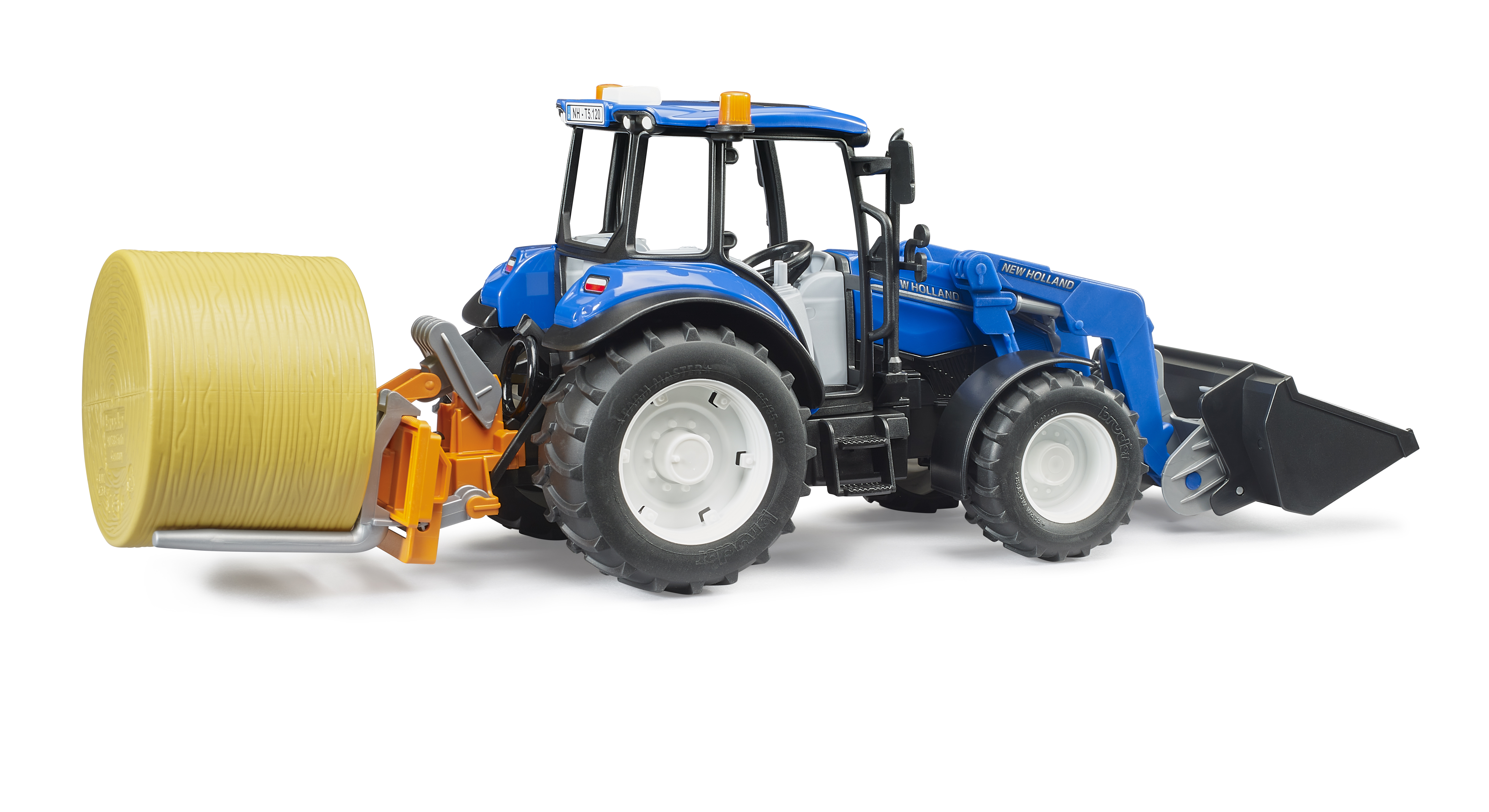 BRUDER 2187 Traktor New Holland T5.120 s čelním nakladačem, korbou, vidlemi a kulatým balíkem